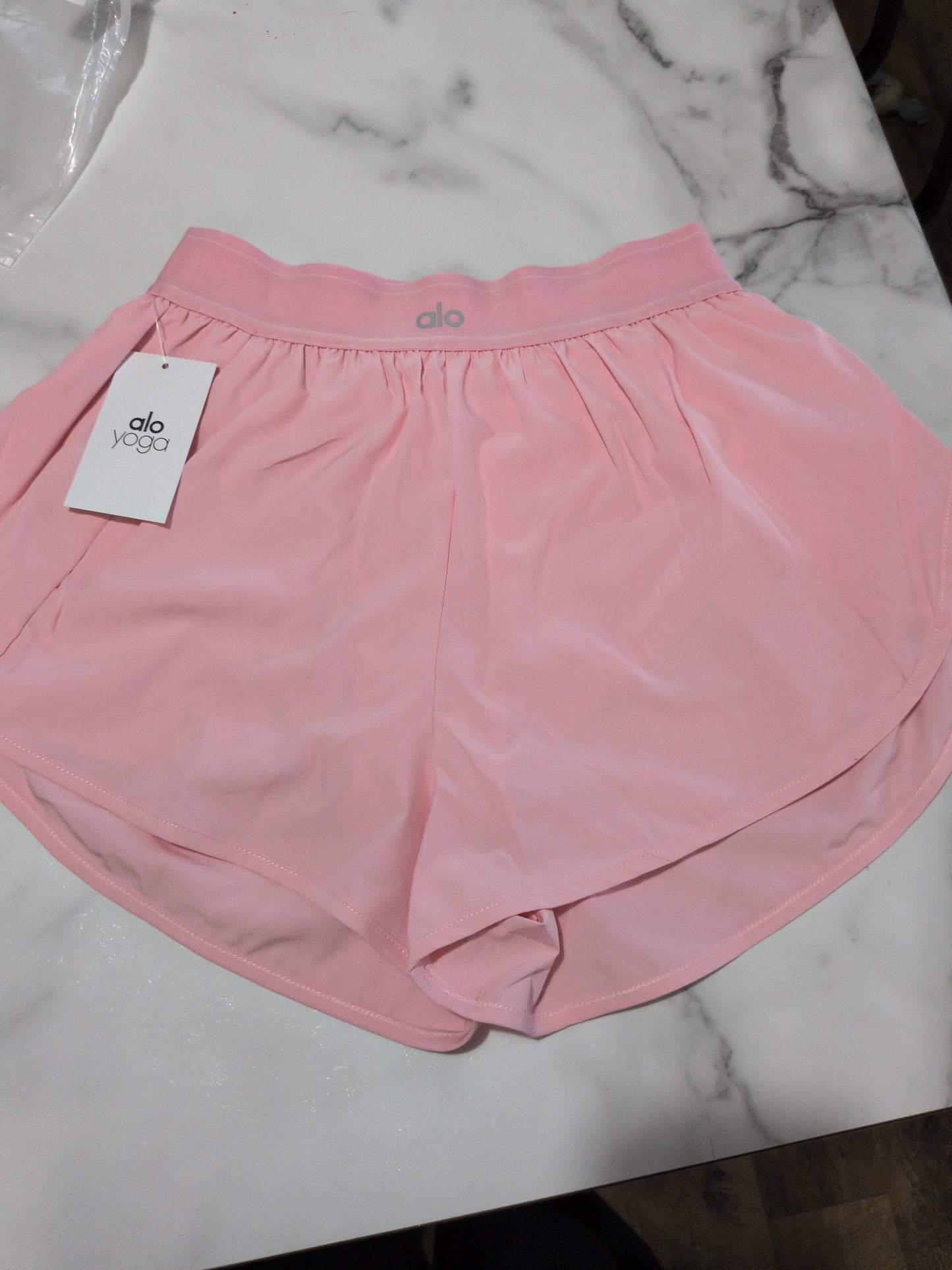 Women's size 4 a.l.o shorts (stain on back)